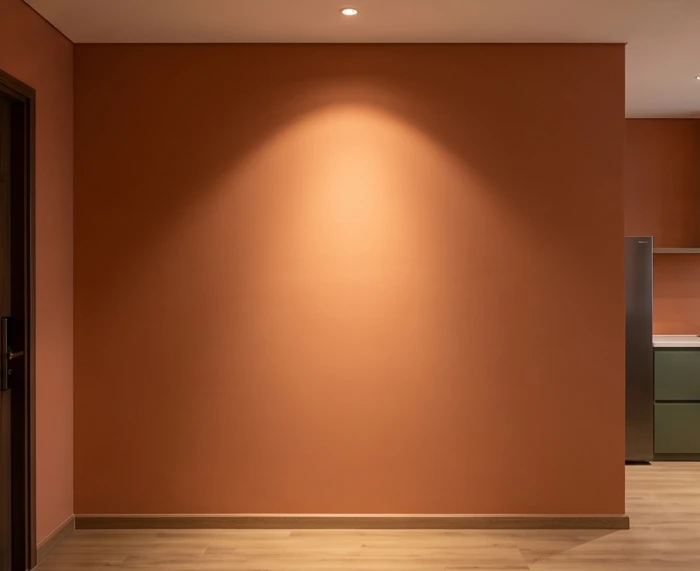 Bề mặt tường sơn màu ấm được chiếu sáng rực rỡ dưới ánh đèn led nhiệt độ màu 3000K