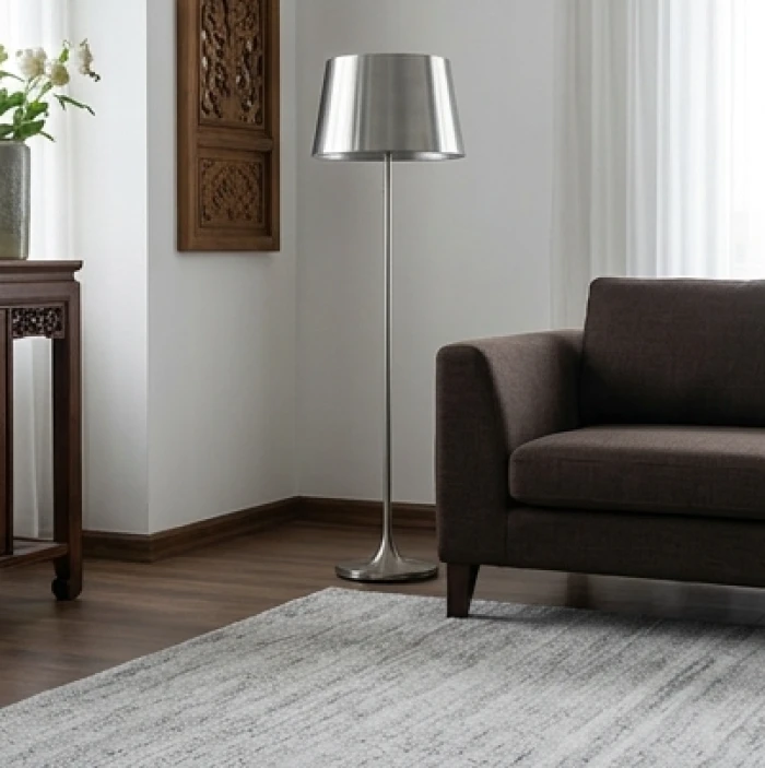 Thảm trải sàn màu ghi xám lót dưới ghế sofa nâu đất để hóa giải xung khắc phong thủy