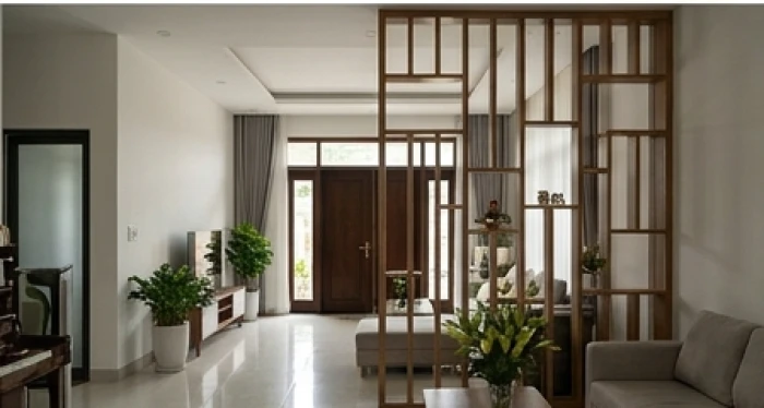 Tủ kệ cao sát trần làm vách ngăn cách cửa chính hóa giải hướng nhà không hợp tuổi 1972