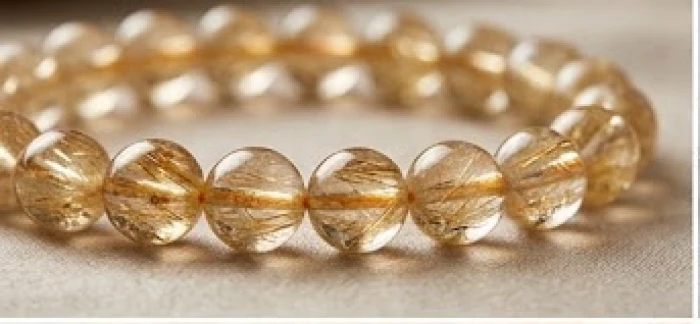 Vòng tay thạch anh tóc vàng cao cấp với các sợi khoáng lấp lánh